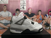 Side view highlighting the white upper, mesh panel, grey molded support, lace supports, and rubber sole.