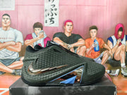 Side profile of a black and silver Nike basketball shoe