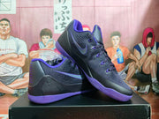 Angled side view showing Nike swoosh branding, textured upper, padded collar, and purple outsole.