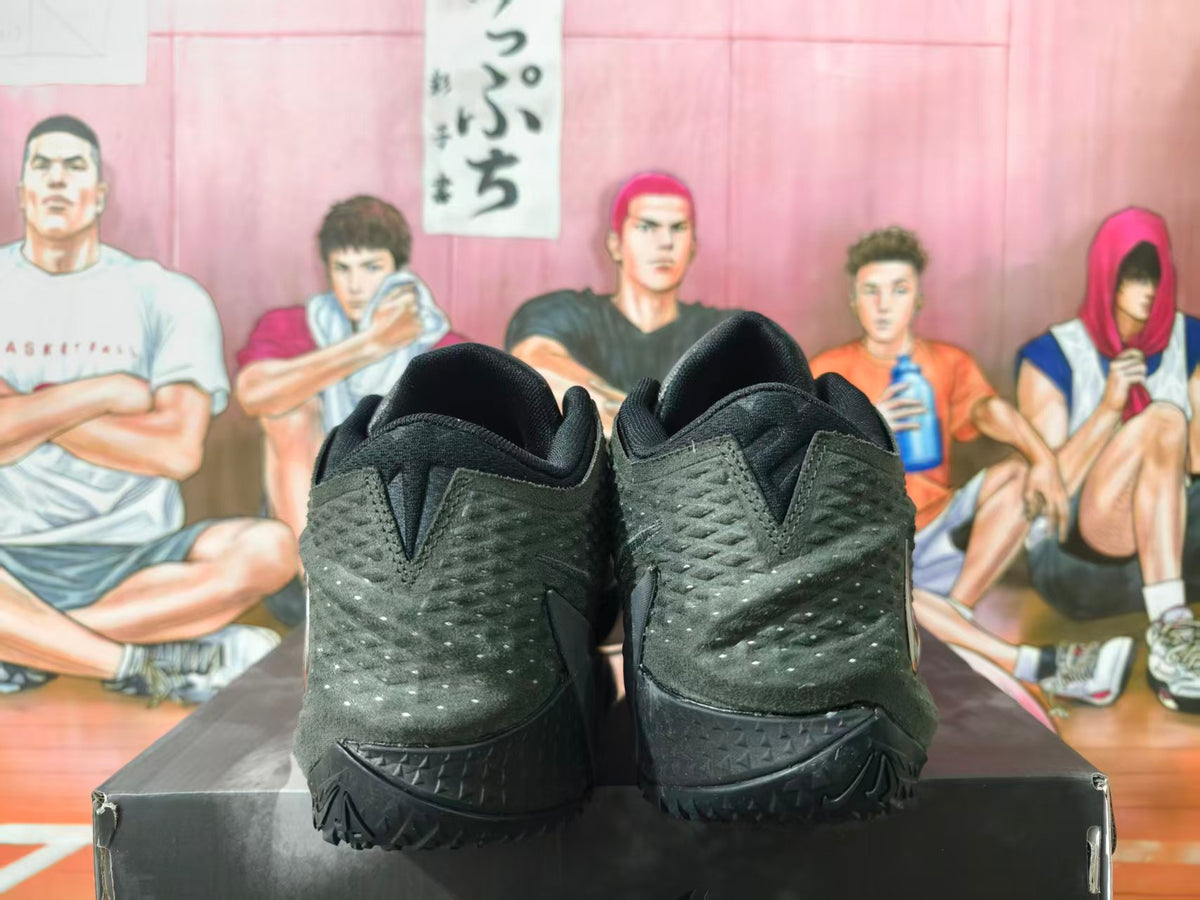 Rear view of black Nike basketball shoes with textured heels