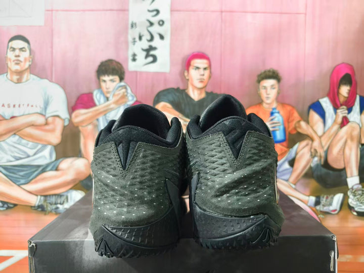 Rear view of black Nike basketball shoes with textured heels