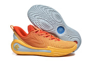 Side and outsole view of the orange sneaker with the blue sneaker positioned behind it.