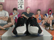 Front view showing white toe panels, black laces, red accents, and Jumpman branding.