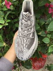 Front top view showing the patterned toe box, laces, and padded collar.