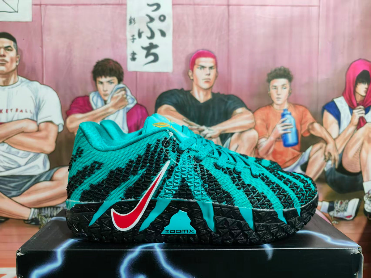 Teal and black Nike basketball shoe shown from the side.