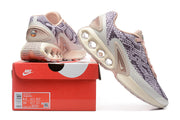 Nike Air Max DN sneakers displayed with a shoe box showing sizes 8.5 and 10