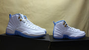 Side-by-side profile view of the white and blue high-top sneakers on boxes.