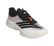 White and gray basketball sneaker with black three-stripe detailing and a red tongue accent.