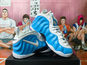 Angled view showing the molded blue sides, white overlays and Swoosh accents
