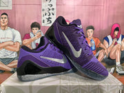 Pair of purple Nike basketball sneakers displayed together, showing the metallic Swoosh and layered black-and-purple construction.