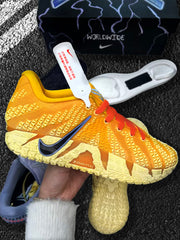 Close side view of the yellow Nike sneaker with red laces, contrasting blue Swoosh, and textured sole.