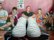 Front view showing the white laces, textured gray uppers, and padded collars of the sneakers.