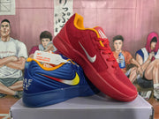 Angled view of red and blue mismatched Nike basketball sneakers, showing the red shoe over the blue shoe and contrasting swoosh details.
