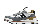 Side profile highlighting the color-block upper and layered sole.