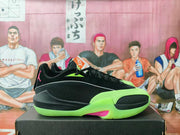 Side view of black Jordan Luka 1 basketball shoes with bright green and pink accents