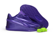 Side profile and patterned outsole of a deep purple Nike KD 19 basketball shoe.