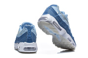 Rear and outsole views of blue Nike Air Max 95 sneakers.