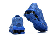 Rear and outsole views of blue Nike Shox Ride 2 sneakers.