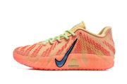 Side profile of an orange Nike basketball sneaker with a blue swoosh and translucent orange outsole.