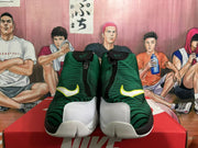 Front view showing the zippered upper, yellow-edged Nike Swoosh accents and white forefoot sections.