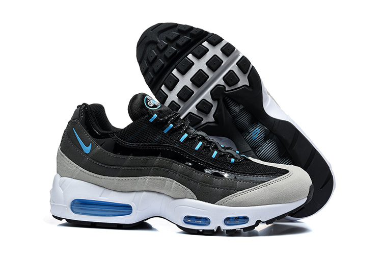 Pair of black, grey and blue Nike Air Max 95 TT sneakers shown from the side and underneath.