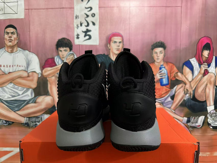 Rear view of black Nike Hyperdunk basketball shoes with grey heel detailing
