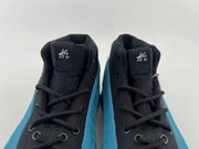 Pair of black tongues with A.E. marks and black laces