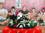 Side view of a military green camouflage Nike basketball sneaker with black laces, red Swoosh branding, white panels, and a textured black outsole.