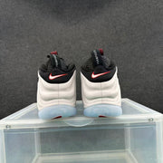 Rear view of the pair, showing white molded heel sections, black collars, red-accented heel branding, and translucent outsoles.