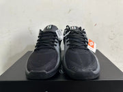 Front view showing black uppers, grey trim, and lace-up closures