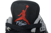Close-up of the tongue showing red Jumpman branding and embroidered script detail.