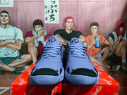 Front view of the pair showing purple uppers, black toe detailing, and KD markings on the tongues.