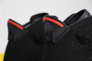 Close-up of the black side panel, perforations and infrared-accented collar hardware.
