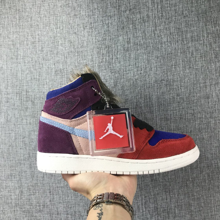 Side view of a multicolor high-top Jordan sneaker with red, purple, pink, blue, and black panels, a furry collar, and a light outsole.
