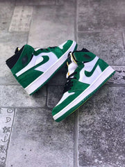 Pair of green and white high-top sneakers arranged on a tiled surface.
