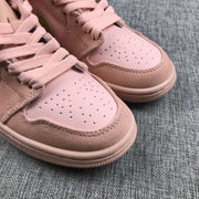 Close-up of the perforated toe boxes and pink laces on the pair.