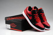 Sneakers displayed beside a black and red Jordan-branded shoebox; the visible box label shows EU 42.