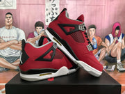 Angled view of the red and black sneaker pair highlighting the side panels, mesh sections, and visible sole detail.