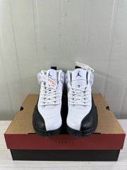 Front view of the pair showing white laces, white tongues, black toe sections, and blue branding details.