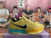 Side profile highlighting the layered yellow upper, black Swoosh, blue-green midsole section, and textured outsole.