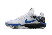 Side profile of a white basketball shoe with blue Swoosh and spotted heel detail