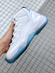 Side profile of the white and blue sneaker with a glossy upper and blue outsole.