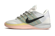 Side profile of the white and mint Nike Sabrina 3 shoe