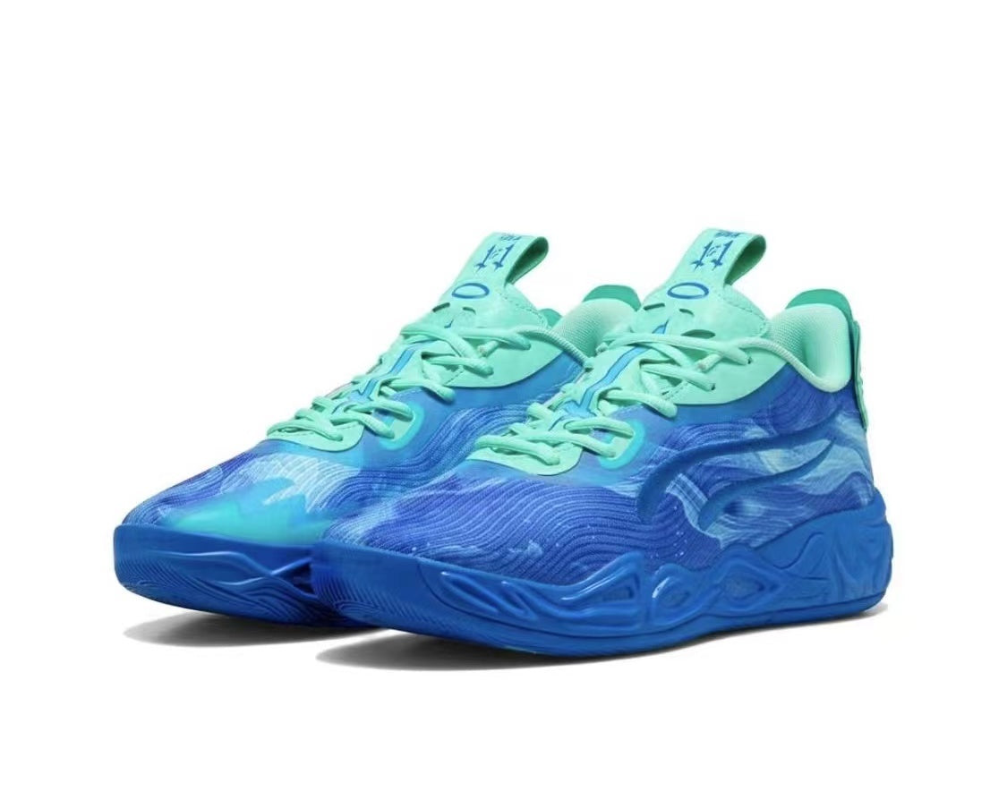 Pair of blue and aqua lace-up sneakers with layered wave-pattern uppers and sculpted blue outsoles
