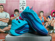 Angled view of the blue Nike sneakers showing the side Swoosh, heel cushioning area, and outsole.