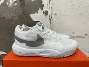 Side view of a white and grey Nike Hyperquick low-top training shoe
