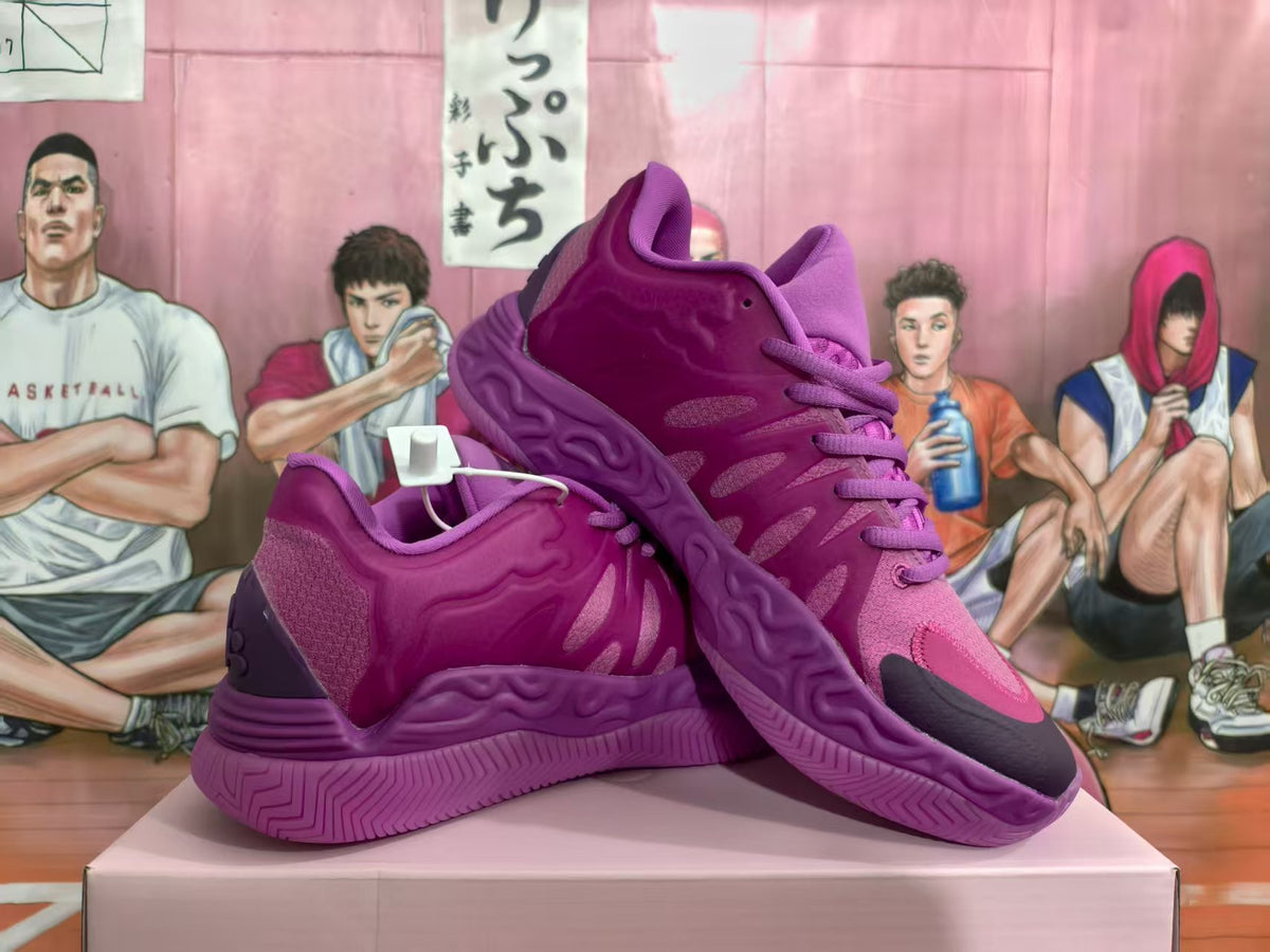 Pair of purple basketball-style sneakers shown from the side on a box.