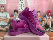 Pair of purple basketball-style sneakers shown from the side on a box.