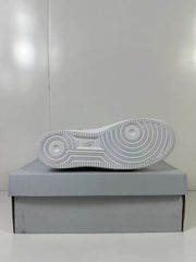 Underside view showing the white rubber outsole with concentric circular traction patterns.