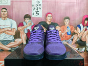 Front view of purple Nike Kobe basketball shoes with purple laces